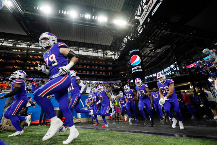 The Bills jog onto the field in Detroit before a game against the Browns